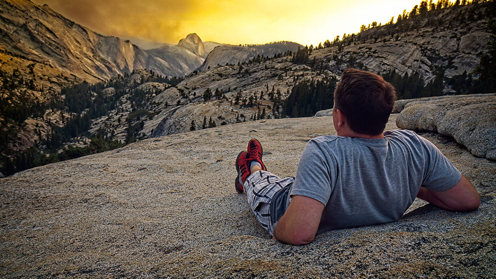 Christian observes a forest fire from Olmstedt Point, Yosemite National Park