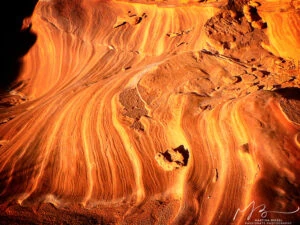 Sunset light is shining on a natural wave.