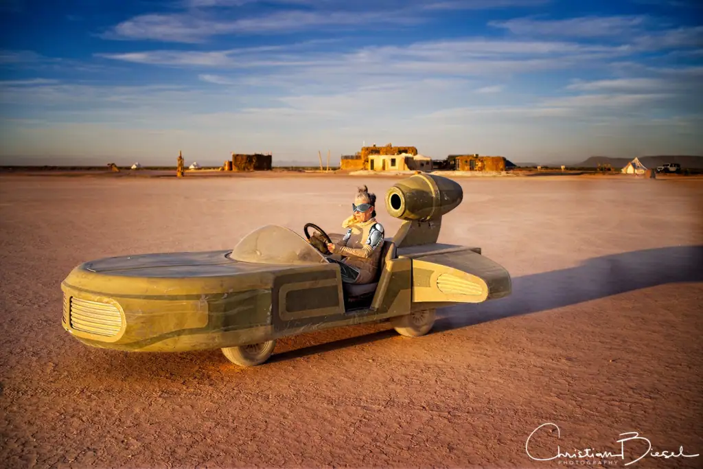 Sand Cruiser ride on Mud Lake, Outpost X in the background